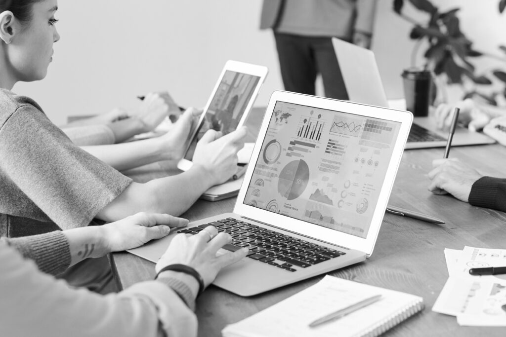 Apex Conversions digital marketing agency team collaborating on a client performance marketing strategy